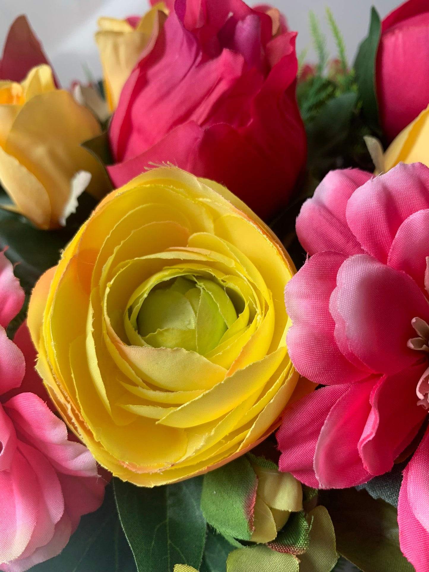 Pink and Yellow Teacup Flower Arrangement